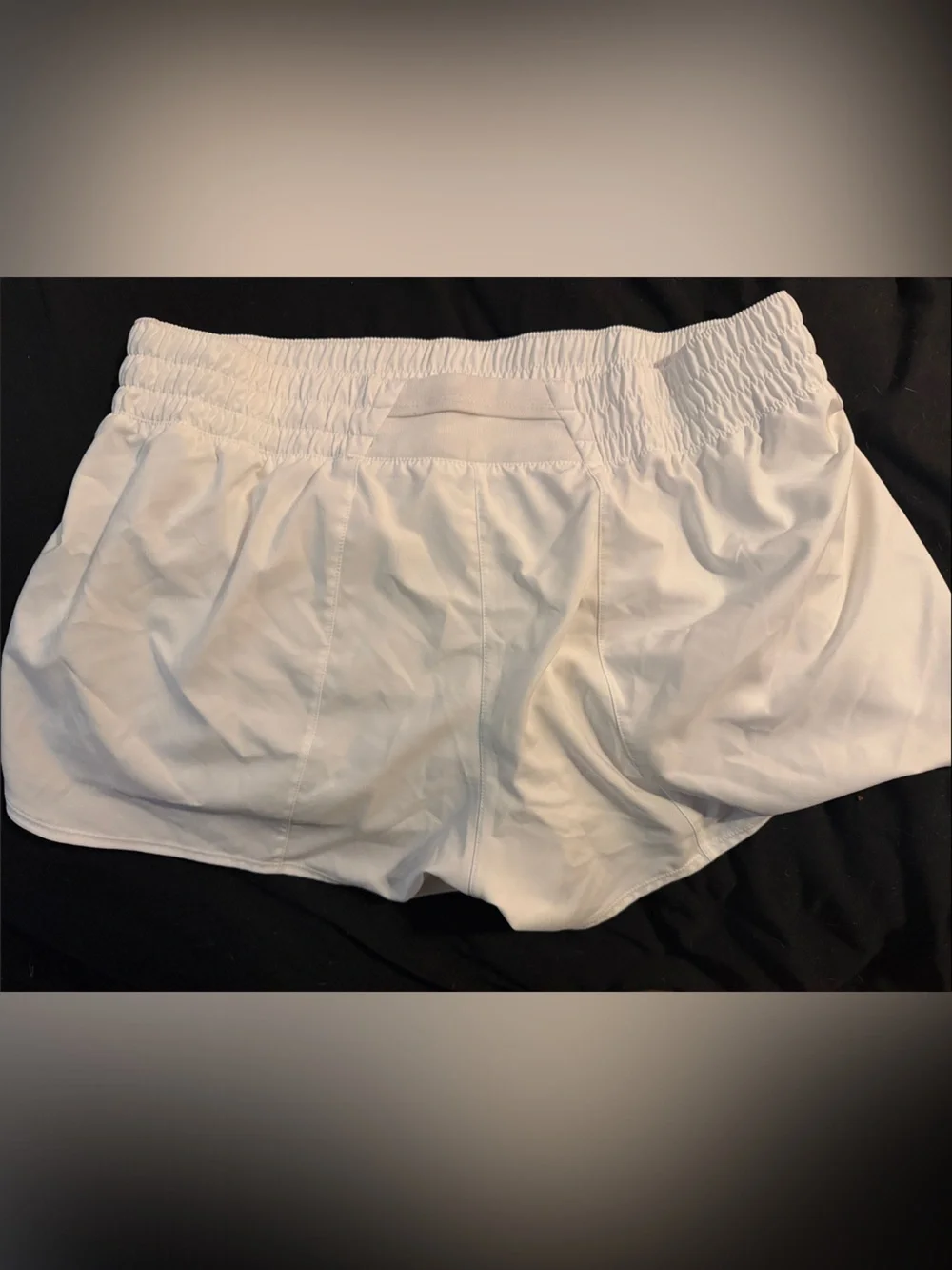 Nike White Women's Athletic Shorts with Silver Swoosh